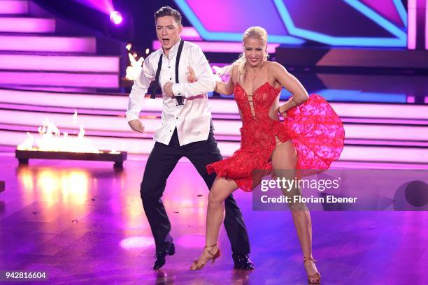 Heiko Lochmann and Kathrin Menzinger perform on stage during the 3rd show of the 11th season of the television competition 'Let's Dance' on April 6,...