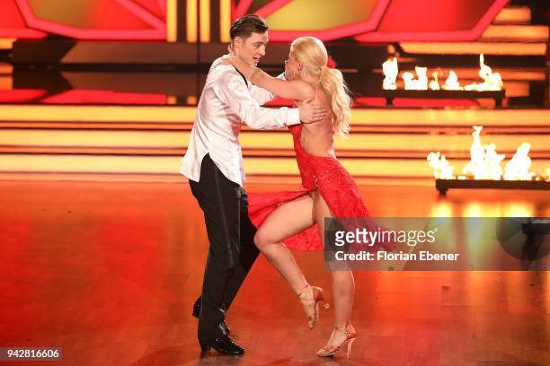 Heiko Lochmann and Kathrin Menzinger perform on stage during the 3rd show of the 11th season of the television competition 'Let's Dance' on April 6,...