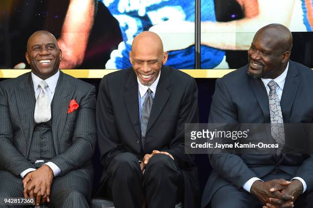 Los Angeles Lakers legends Ervin Magic Johnson, Kareem Abdul-Jabbar and Shaquile O'Neal share a laugh during the unveiling ceremony of a bronze...