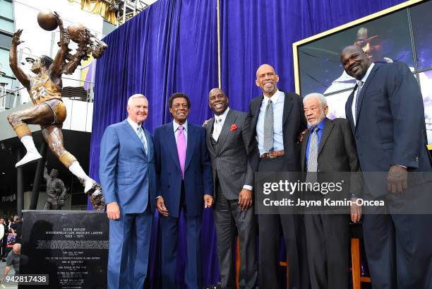 Los Angeles Laker legends pose after the unveiling of a statue of Minneapolis and Los Angeles Lakers and Hall of Famer, Elgin Baylor, second from...