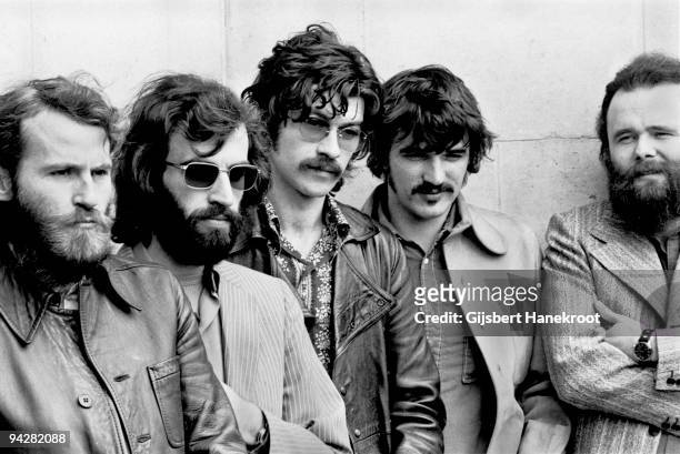 Levon Helm, Richard Manuel, Robbie Robertson, Rick Danko and Garth Hudson of The Band pose for a group portrait in London in June 1971.