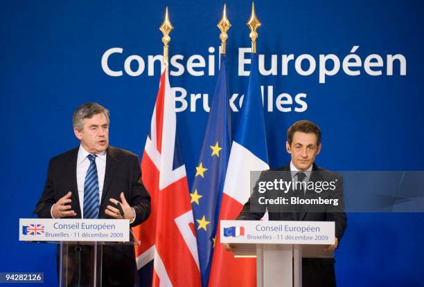 Gordon Brown, U.K. Prime minister, left, speaks as Nicolas Sarkozy, France's president, listens during their joint press conference following the...