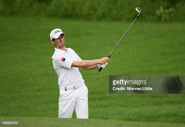 Gregory Bourdy of France plays his second shot into the 13th green during the second round of the Alfred Dunhill Championship at Leopard Creek...