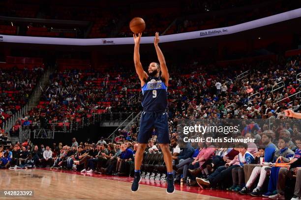 Aaron Harrison of the Dallas Mavericks shoots the ball against the Detroit Pistons on April 6, 2018 at Little Caesars Arena in Detroit, Michigan....