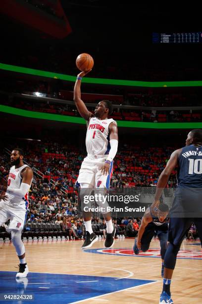 Reggie Jackson of the Detroit Pistons shoots the ball during the game against the Dallas Mavericks on April 6, 2018 at Little Caesars Arena in...