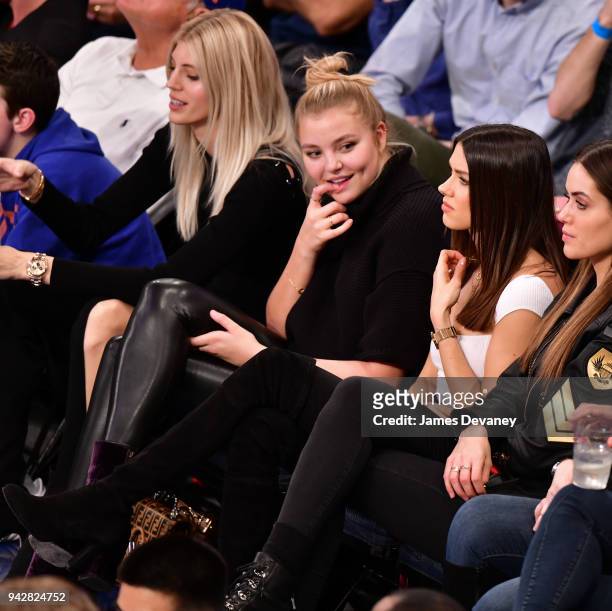 Devon Windsor and Rachel Hilbert attend New York Knicks Vs Miami Heat game at Madison Square Garden on April 6, 2018 in New York City.