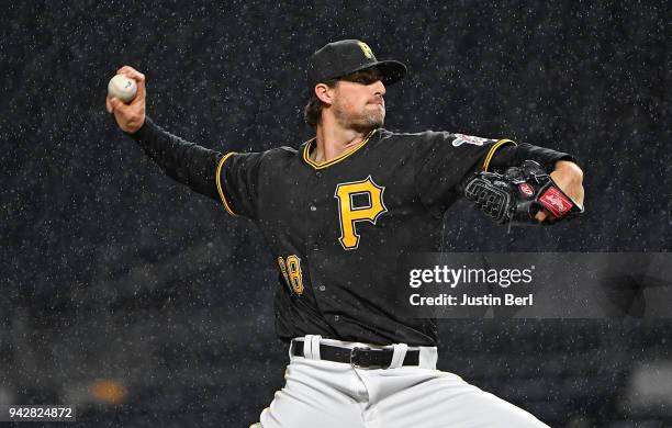 Clay Holmes of the Pittsburgh Pirates delivers a pitch in the eighth inning during the game against the Cincinnati Reds at PNC Park on April 6, 2018...