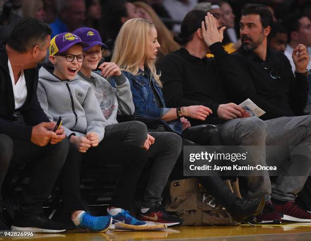 Zlatan Ibrahimovi of the Los Angeles Galaxy attends the game between the Los Angeles Lakers and the Minnesota Timberwolves with his wife Helena...