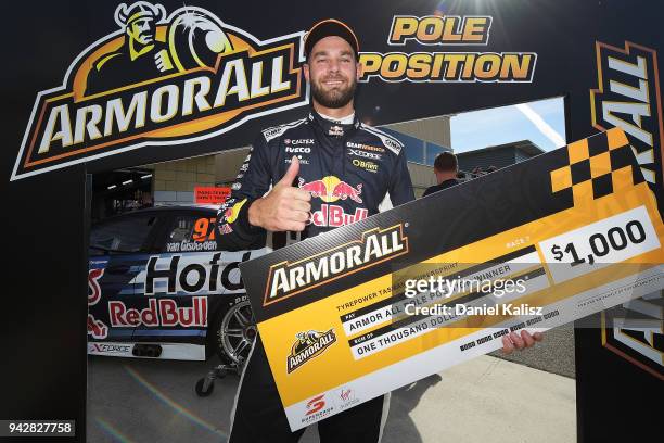 Shane Van Gisbergen driver of the Red Bull Holden Racing Team Holden Commodore ZB celebrates after taking pole position for race 1 during qualifying...