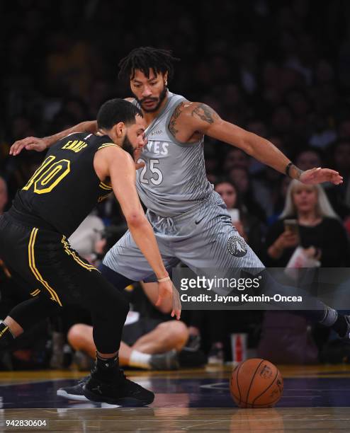 Derrick Rose of the Minnesota Timberwolves defends Tyler Ennis of the Los Angeles Lakers as he drives to the basket in the first half of the game at...