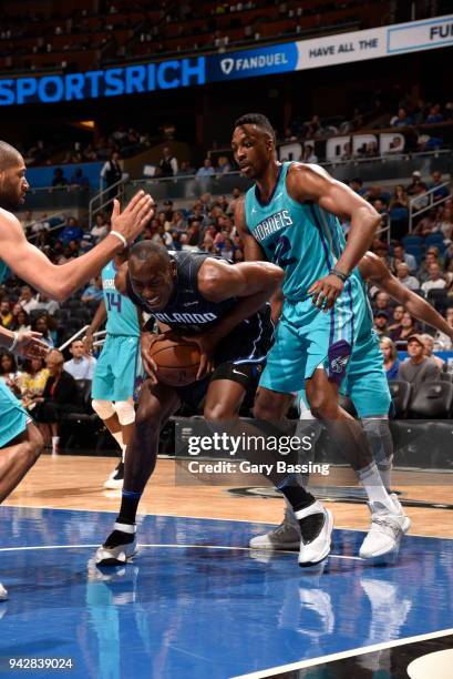 Bismack Biyombo of the Orlando Magic handles the ball against the Charlotte Hornets on April 6, 2018 at Amway Center in Orlando, Florida. NOTE TO...