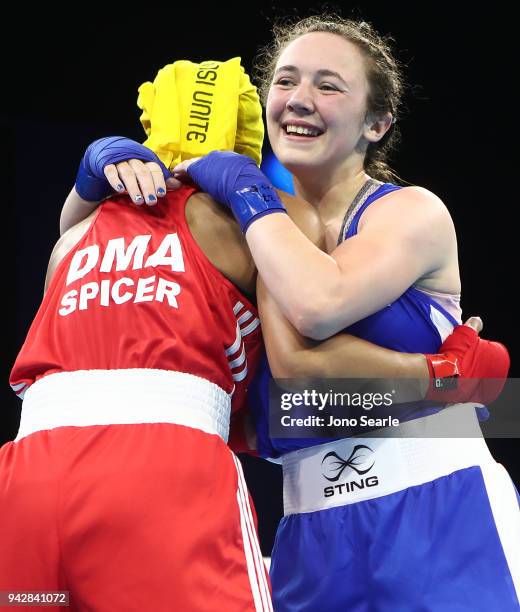 Vikki Glover of Scotland celebrates winning her round of 16 bout against Valerian Spicer of Dominica on day three of the Gold Coast 2018 Commonwealth...