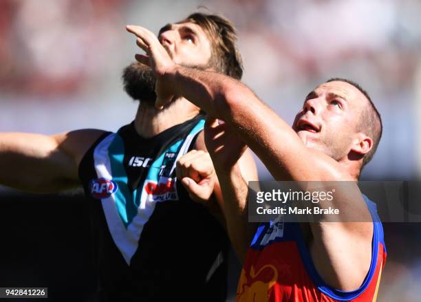 Justin Westhoff of Port Adelaide rucks against Josh Walker of the Lions during the round three AFL match between the Port Adelaide Power and the...