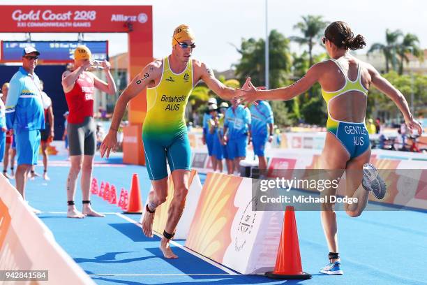 Australian team relay members Jacob Birtwhistle and Ashleigh Gentle change over during the Mixed Team relay during the Triathlon on day three of the...