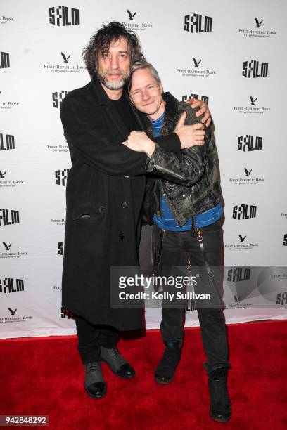 Author Neil Gaiman and director John Cameron Mitchell pose for photos on the red carpet for "How To Talk To Girls At Parties" during the San...