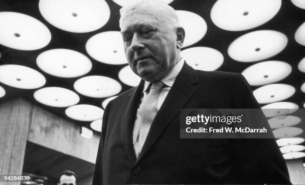 Low-angle view of Hungarian-born architect and furniture designer Marcel Breuer at the ribbon cutting ceremony at the Whitney Museum, which he...