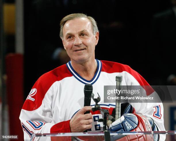 Former Montreal Canadien Guy Lafleur speaks to fans during the Centennial Celebration ceremonies prior to the NHL game between the Montreal Canadiens...