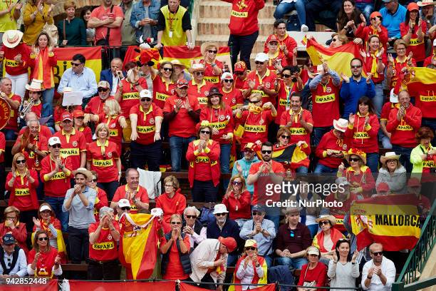 Spanish fans cheer the Spanish team during day one of the Davis Cup World Group Quarter Finals match between Spain and Germany at Plaza de Toros de...