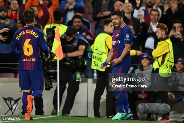 Luis Suarez of Barcelona celebrates scoring his side's fourth goal during the UEFA Champions League Quarter Final First Leg between FC Barcelona adn...