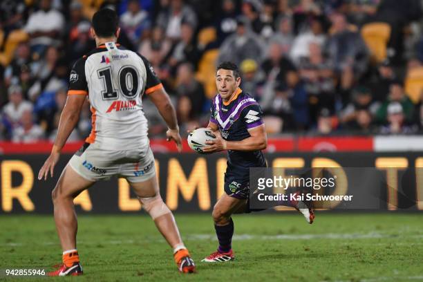 Billy Slater of the Storm charges forward during the round five NRL match between the Wests Tigers and the Melbourne Storm at Mt Smart Stadium on...