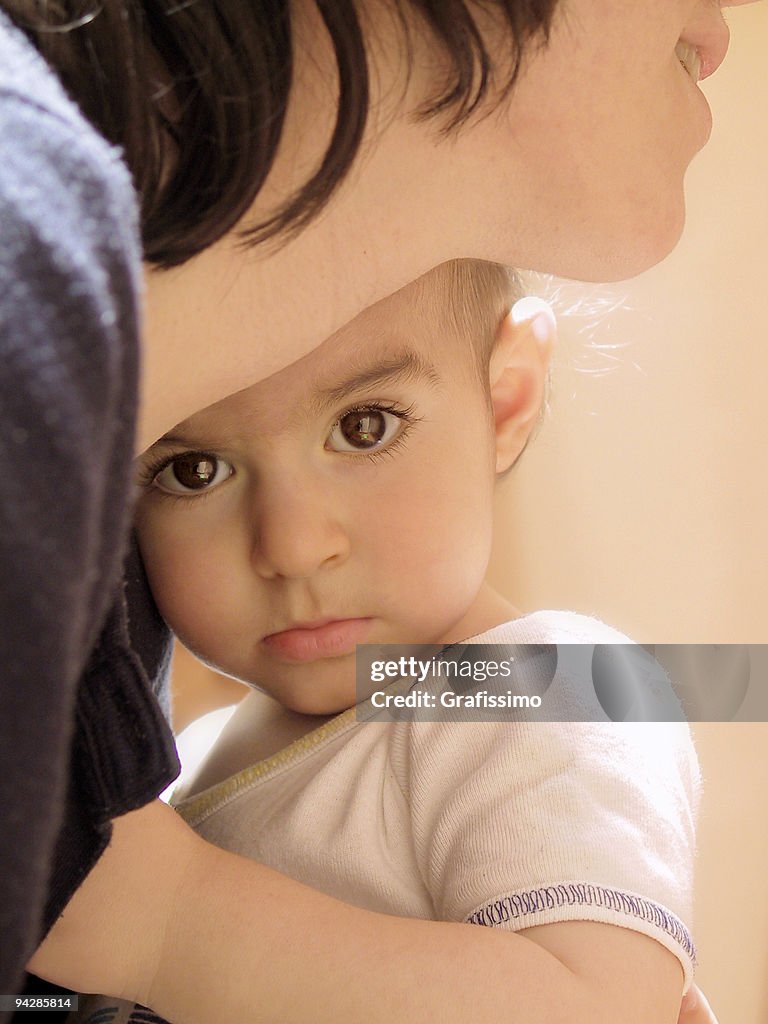 Baby under protection of his mother