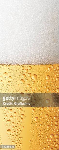 beer with transpiration detail of glass - transpiration stock pictures, royalty-free photos & images