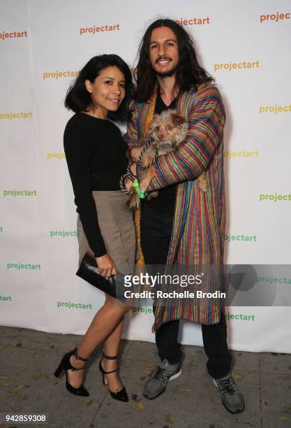 Guest and Kour Pour attends ProjectArt "My Kid Could Do That" Los Angeles Benefit and Exhibition at The Underground Museum on April 6, 2018 in Los...