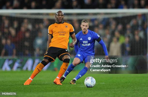 Wolverhampton Wanderers' Benik Afobe battles with Cardiff City's Joe Bennett during the Sky Bet Championship match between Cardiff City and...