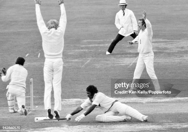 Mushtaq Mohammad of Pakistan survives a runout attempt by England wicketkeeper Alan Knott during the 2nd Test match between England and Pakistan at...