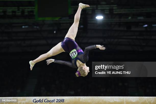 Scotland's Cara Kennedy competes on the balance beam during the women's individual all-around final in the artistic gymnastics event during the 2018...