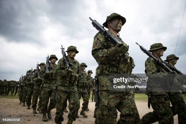 Soldiers of Japanese Ground Self-Defense Force , the brand-new Marinesnamed The Amphibious Rapid Deployment Brigade attend a ceremony in Camp Ainoura...