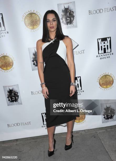 Actress Liliana Nova arrives for the premiere of "Blood Feast" held at Ahrya Fine Arts Theater on April 6, 2018 in Beverly Hills, California.