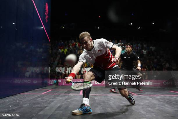 Nick Matthew of England plays a forehand during his Men's Singles Quarter Final match against Nafiizwan Adnan of Malaysia on day three of the Gold...