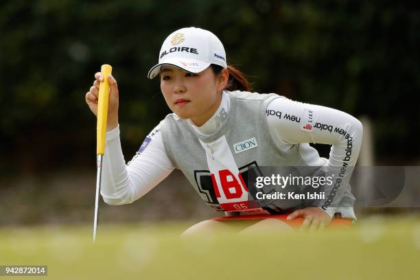 Hinako Yamauchi of Japan lines up for her putt on the 8th green during the final round of the Hanasaka Ladies Yanmar Golf Tournament at Biwako...