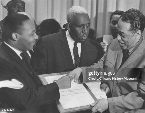 The Rev. Martin Luther King and jazz great Duke Ellington at the American Emancipation Centennial held at McCormick Place, Chicago, 1963. The man...