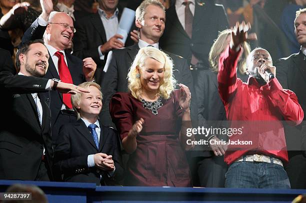 Singer Wyclef Jean dances in the royal box with Norway's Crown Princess Mette-Marit, Marius Borg and Crown Prince Haakon at the Nobel Peace Prize...