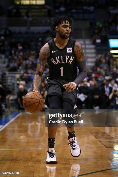 Angelo Russell of the Brooklyn Nets dribbles the ball in the first quarter against the Milwaukee Bucks at the Bradley Center on April 5, 2018 in...