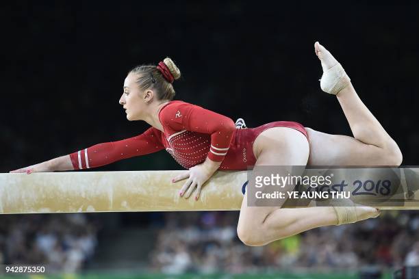 Isle of Man's Nicole Burns competes on the balance beam during the women's individual all-around final in the artistic gymnastics event during the...
