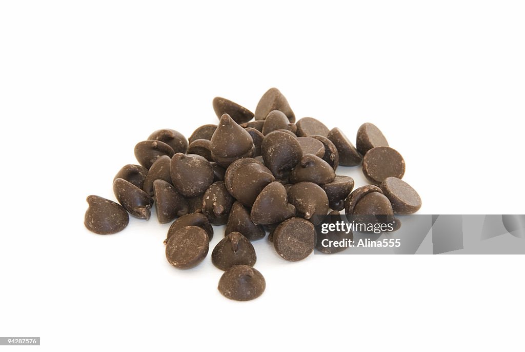 Pile of chocolate chips on white