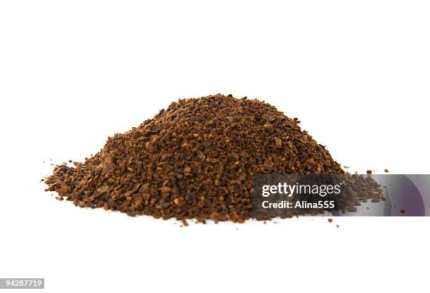 pile of fresh ground coffee on white - ground coffee stock pictures, royalty-free photos & images