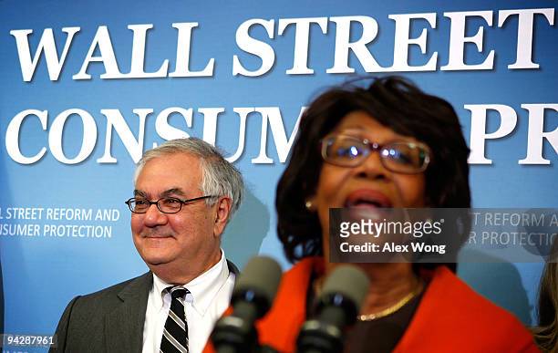 Rep. Maxine Waters speaks as Rep. Barney Frank listens during a news conference on Capitol Hill December 11, 2009 in Washington, DC. The House has...