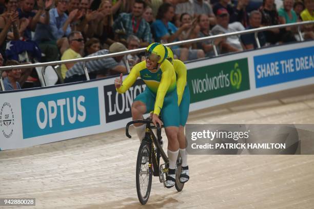 Australia's Brad Henderson and pilot Tom Clarke react after competing in the men's B&VI sprint finals cycling during the 2018 Gold Coast Commonwealth...