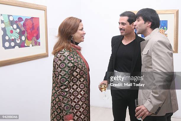 Ramola Bachchan with Robert Vadra and designer Suneet Verma during an exhibition of Paintings of Namrita Bachchan at Palette Art Gallery.