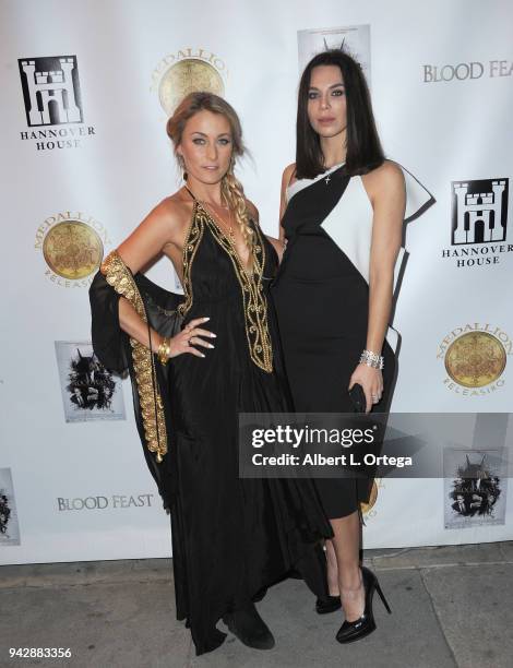 Actress Sadie Katz and actress Liliana Nova arrive for the Premiere Of "Blood Feast" held at Ahrya Fine Arts Theater on April 6, 2018 in Beverly...