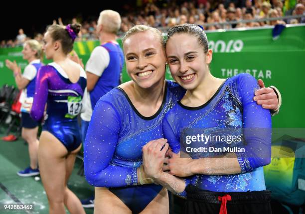 Elsabeth Black of Canada celebrates as she wins gold in the Women's Individual All-Around Final with Isabela Onyshko of Canada during Gymnastics on...