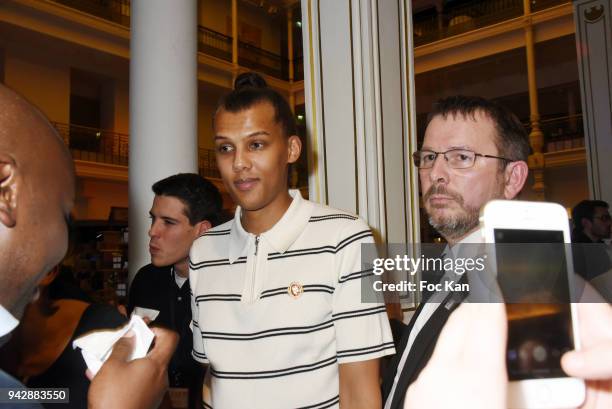 Singer Stromae attends the Mosaert Fabrique Party at Le Bon Marche on April 6, 2018 in Paris, France.