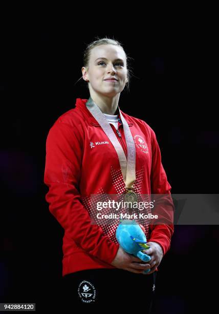 Gold medalist Elsabeth Black of Canada looks on during the medal ceremony for the Women's Individual All-Around Final during Gymnastics on day three...