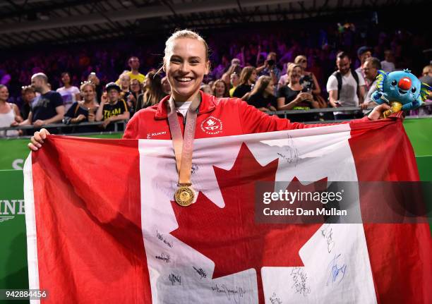 Gold medalist Elsabeth Black of Canada celebrates during the medal ceremony for the Women's Individual All-Around Final during Gymnastics on day...