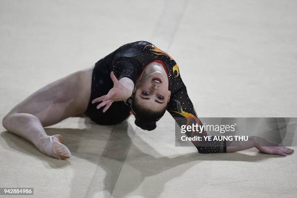 Wales' Latalia Bevan competes on the floor exercise during the women's individual all-around final in the artistic gymnastics event during the 2018...