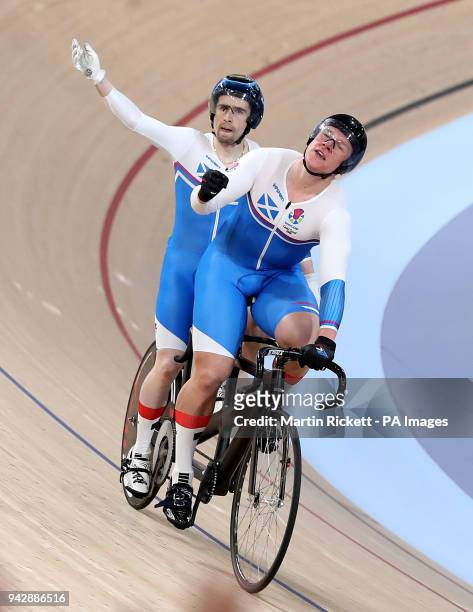 Scotland's Neil Fachie and pilot Matt Rotherham celebrate winning gold in the Men's B&VI Sprint Finals - Gold at the Anna Meares Velodrome during day...